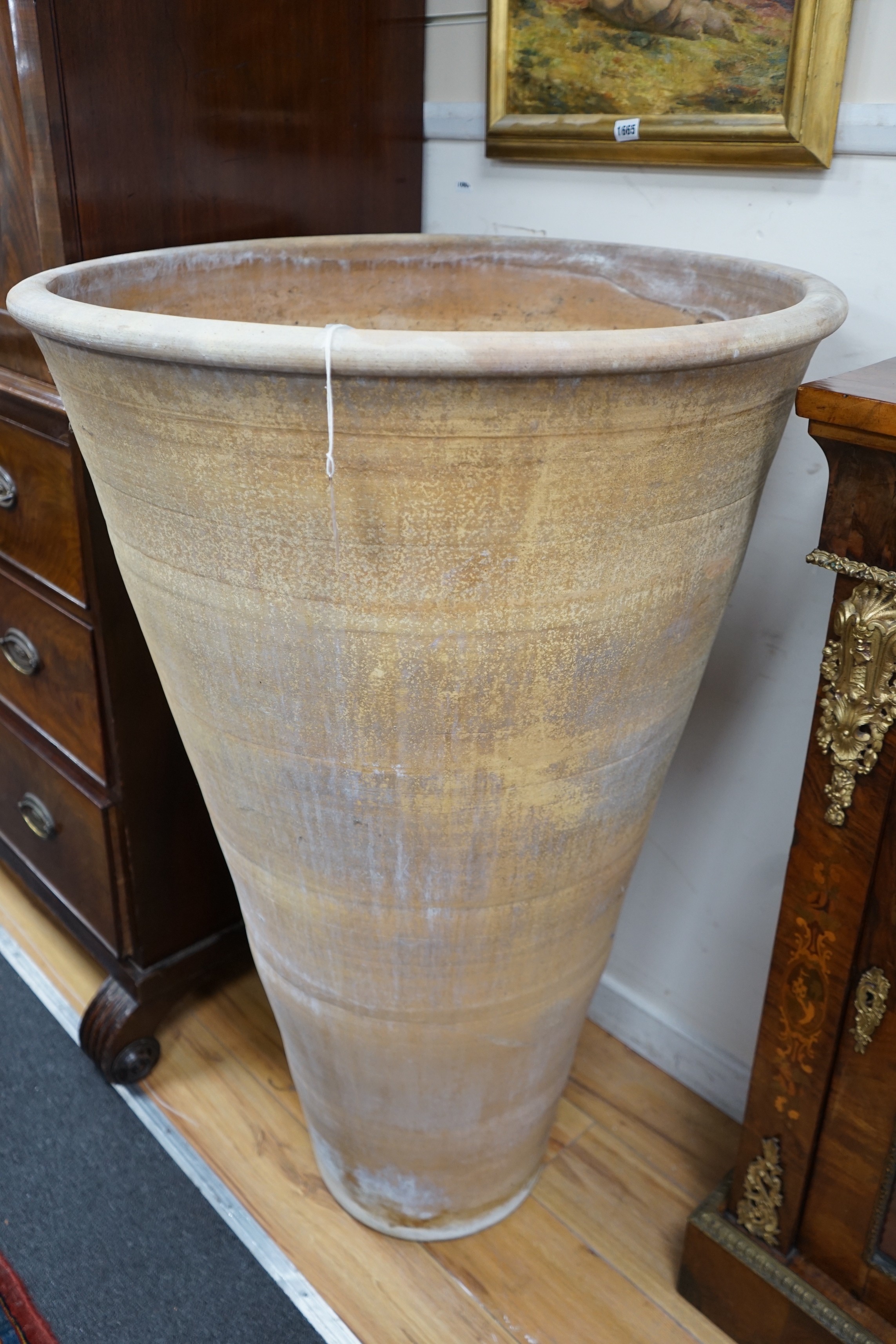 A pair of large terracotta garden urns of circular tapered form, diameter 75cm, height 118cm